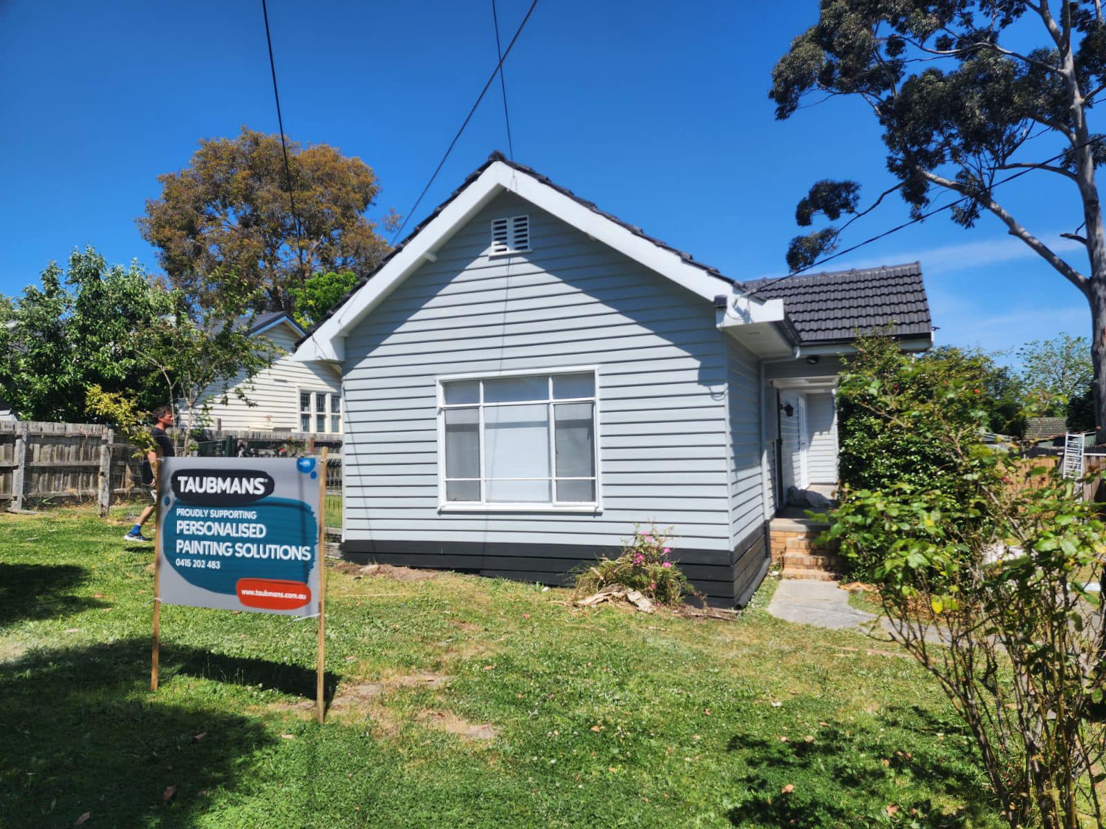 Personalised Painting Solutions located in Croydon, Victoria, Weatherboard painted light grey with white windows in Ringwood East