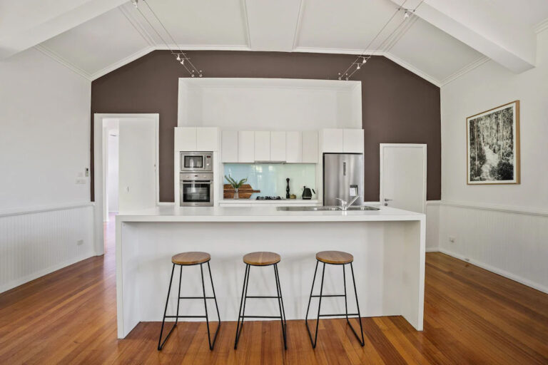 Personalised Painting Solutions located in Croydon, Victoria, painted the Interior of an old church in Whourouly that is an Airbnb, this is a photo of the kitchen