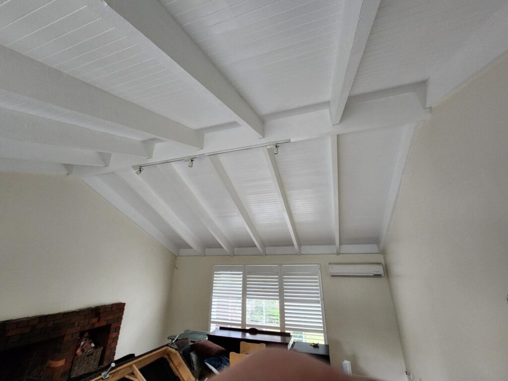 Personalised Painting Solutions located in Croydon, Victoria, painted the wooden cathedral ceilings in a house in Croydon Hills